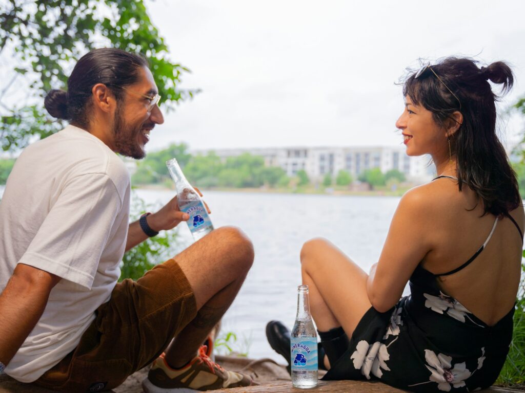 a man and a woman sitting next to each other