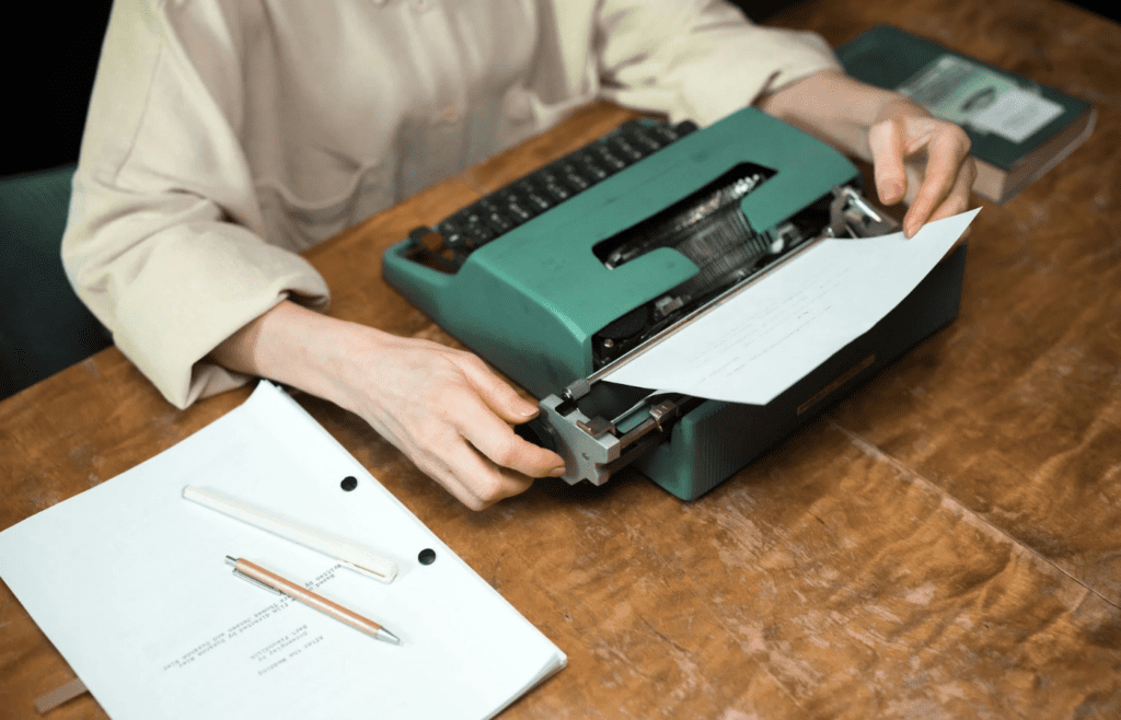 person on typewriter