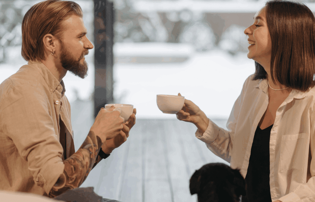 two people drinking coffee