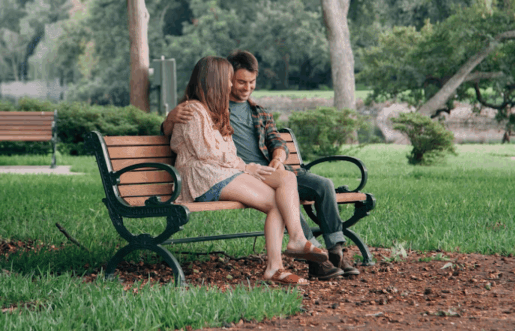 man and woman in park