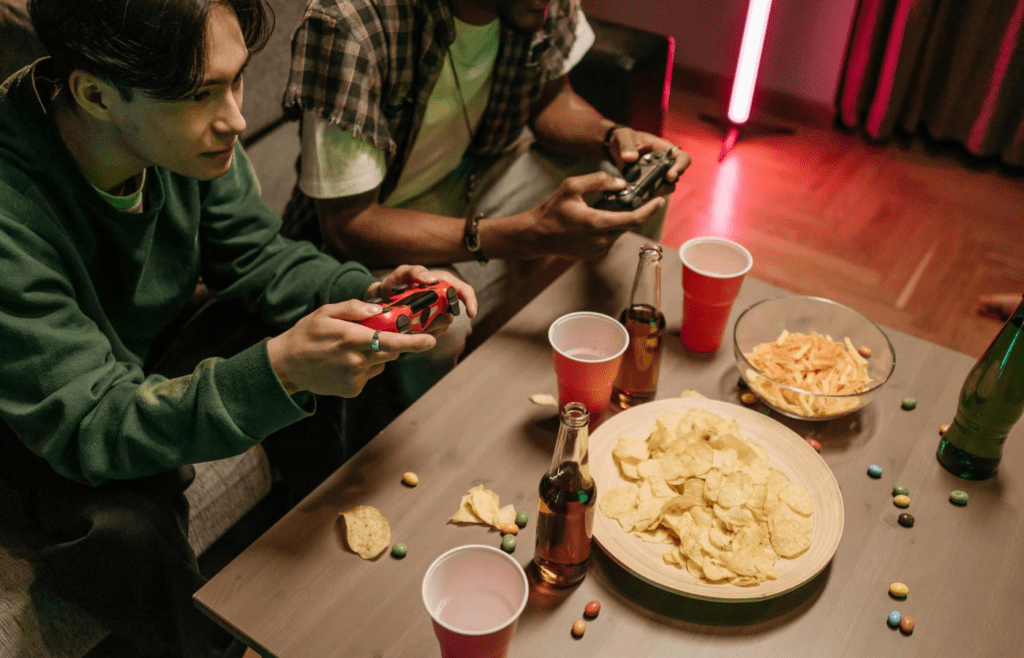 players gaming and snacking