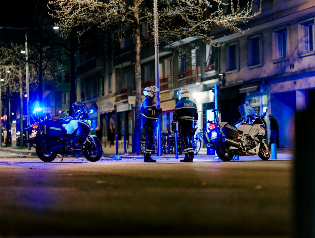 a group of motorcycles parked on the side of a road