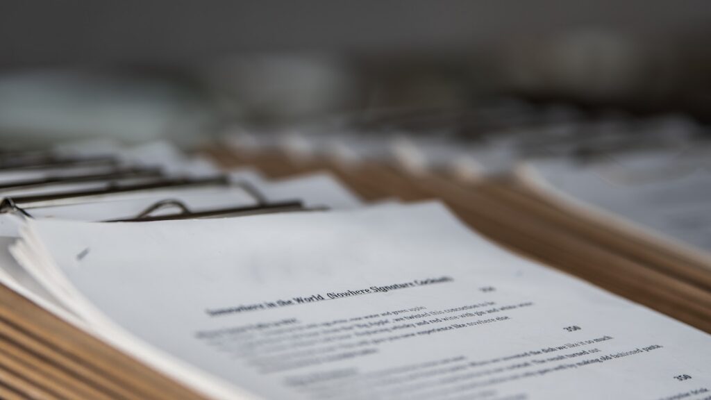 restaurant menus on clipboards close up