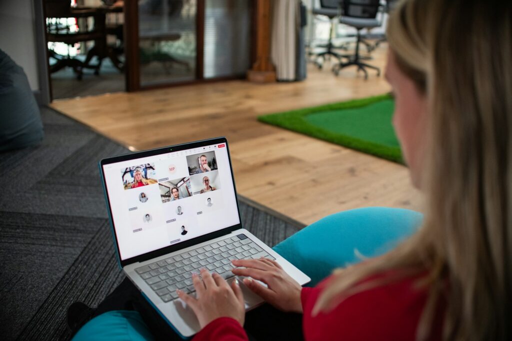 Woman on laptop in video conference call