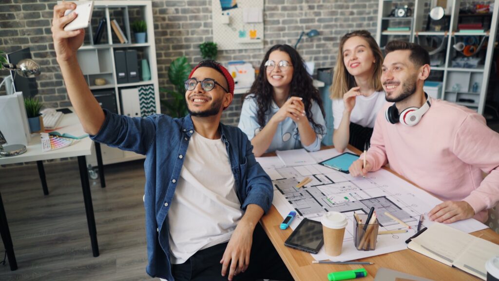 a group of people sitting around a table