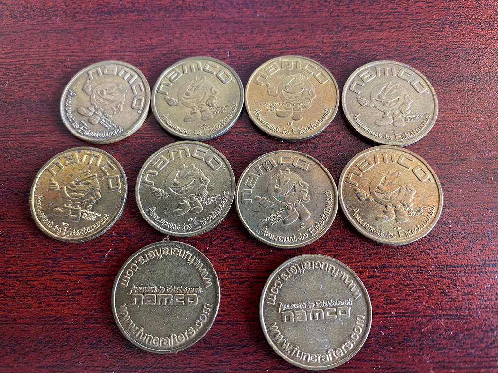 Namco Arcade Tokens on table