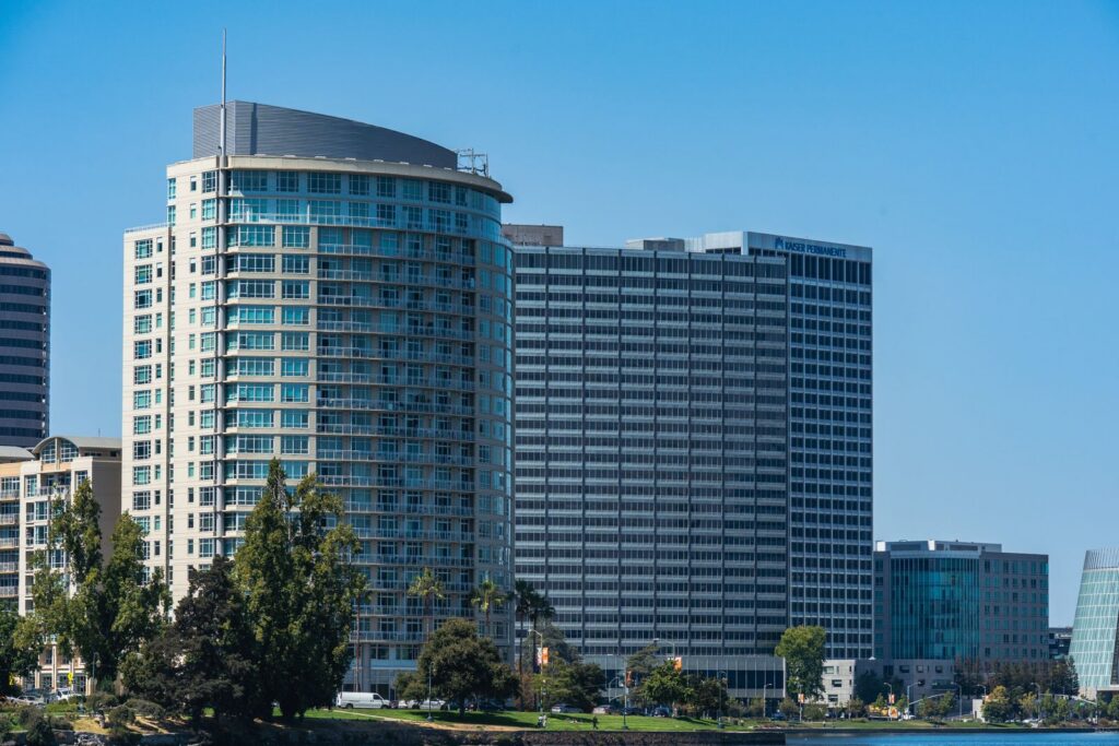 Contemporary architecture in Oakland's skyline on a clear day.