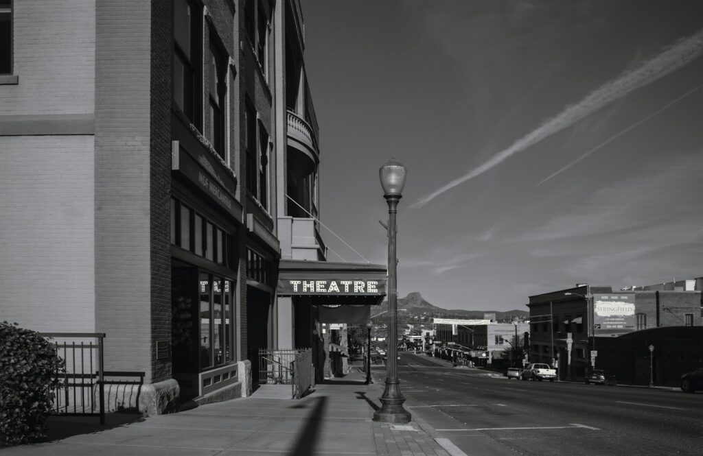 A vintage theatre marquee on a city street