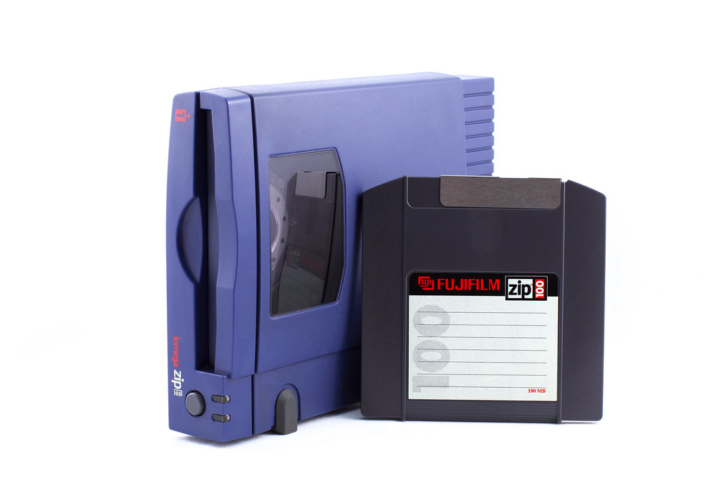 A vintage Zip drive and disk