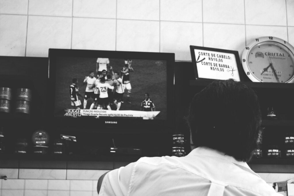 Vintage black-and-white television showing soccer