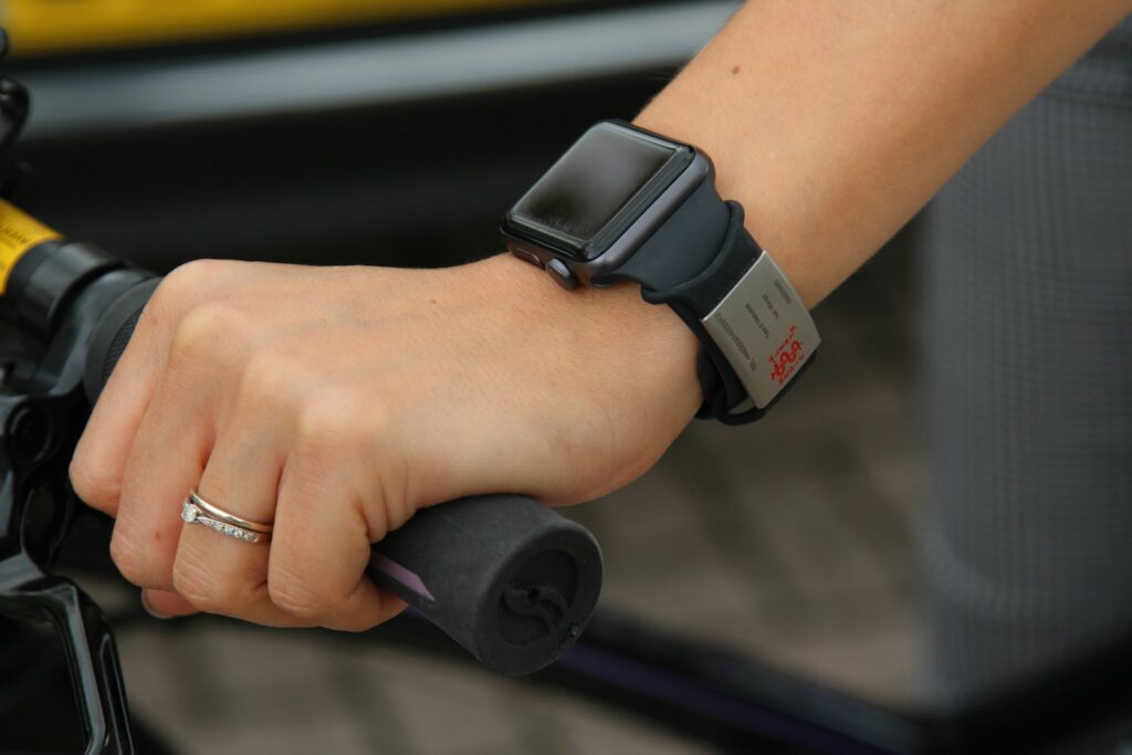 person wearing black smart watch
