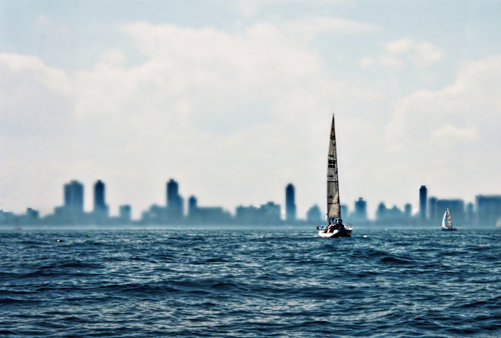 Beautiful view of Lake Michigan with boat and skyline