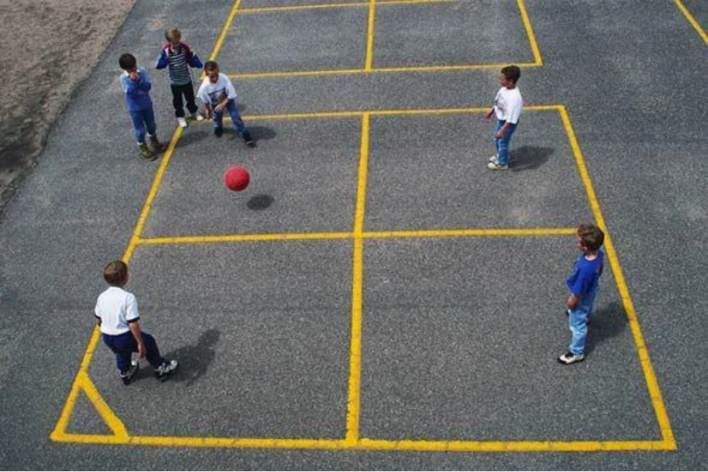Kids playing a foursquare game