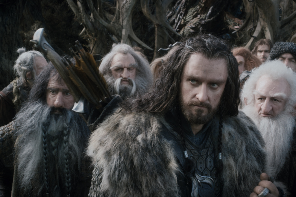 Group of fantasy travelers in rugged clothing from The Hobbit: The Desolation of Smaug.