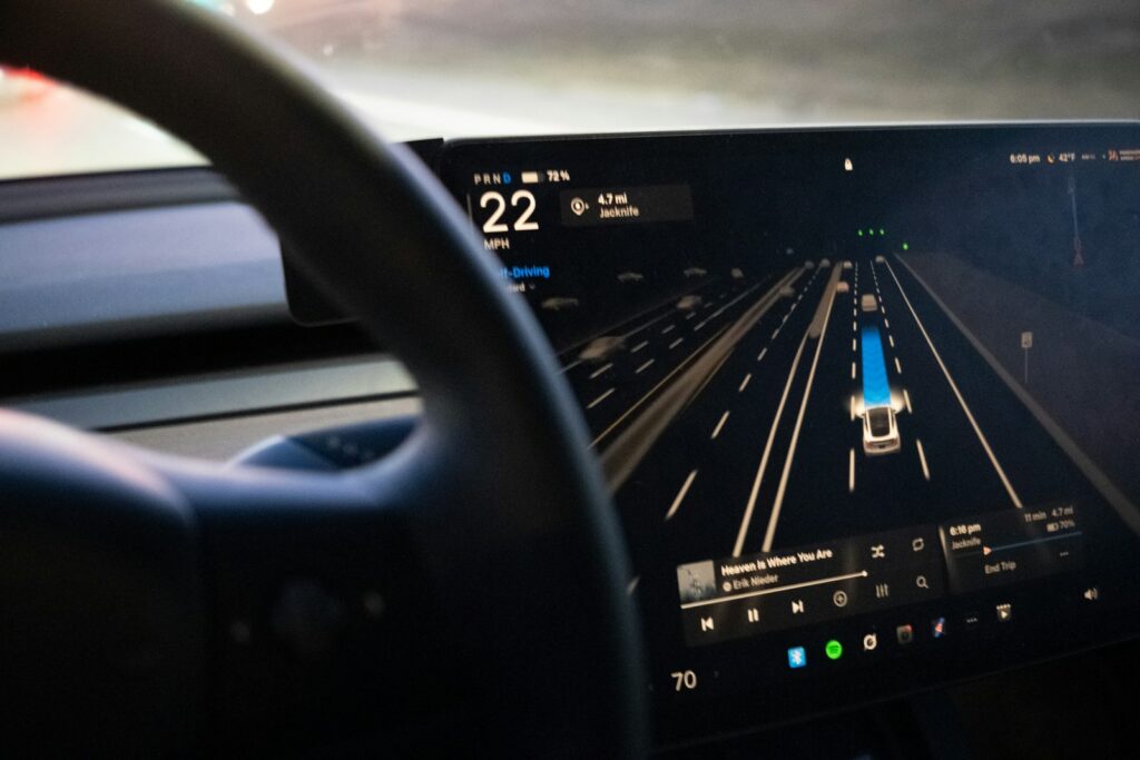Car dashboard displaying autonomous driving interface
