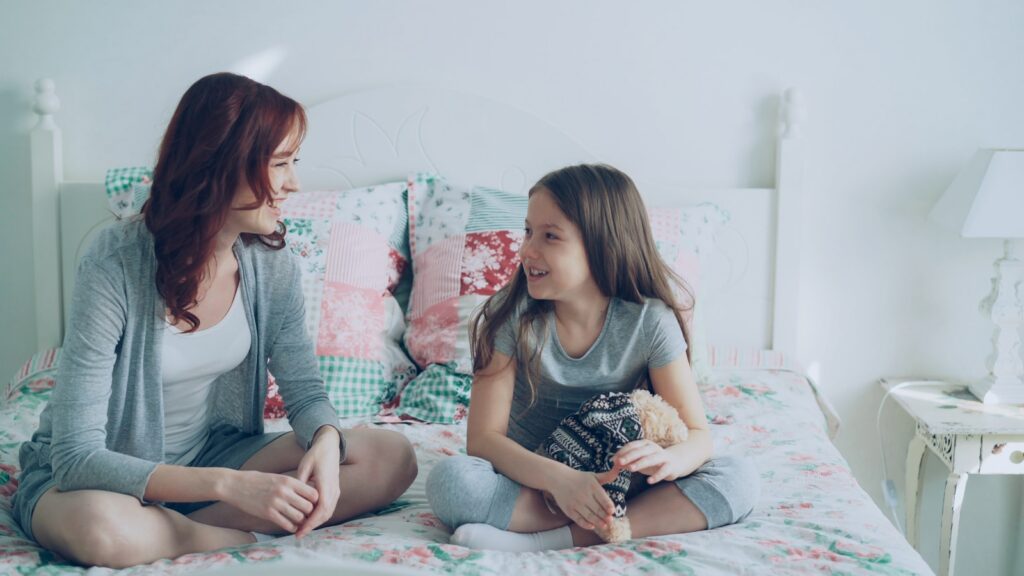 Mother and daughter are having a conversation.
