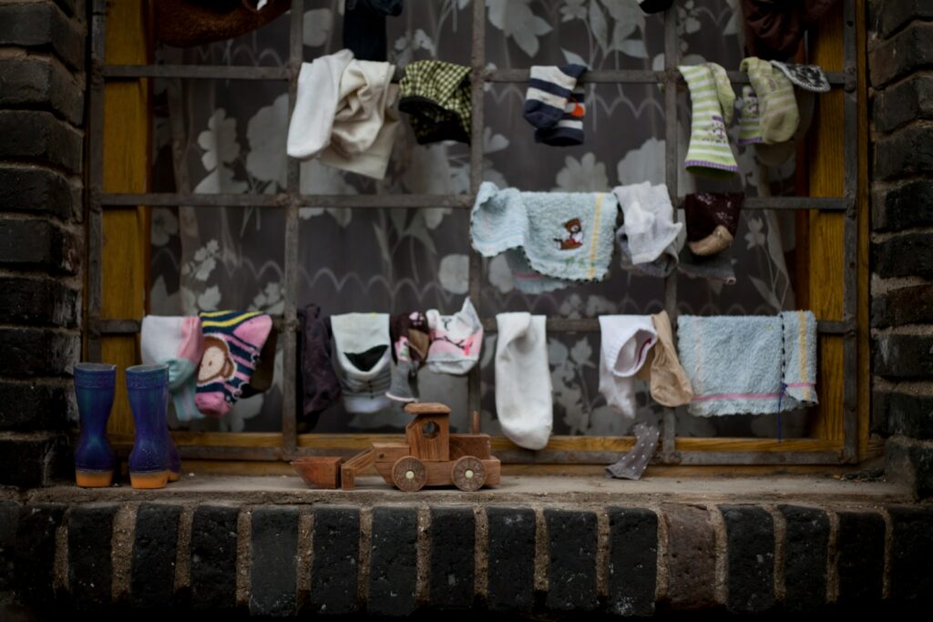 assorted-color socks on window