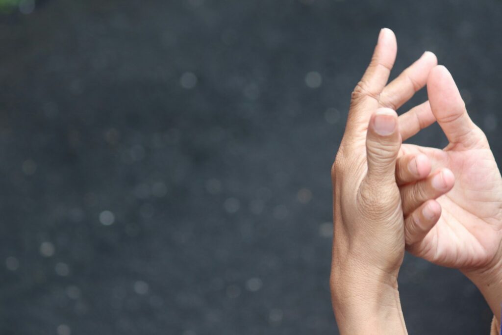 persons hand with white powder