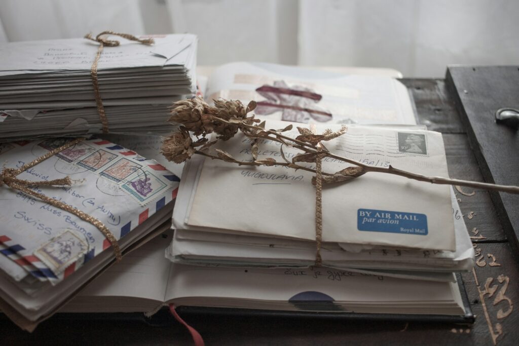 white and blue book on white paper
