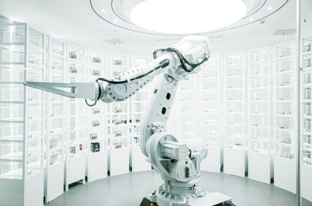 white robotic arm in display showroom