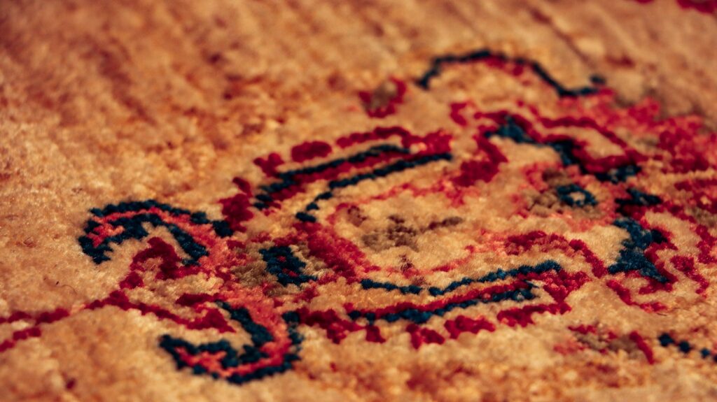 A close up of a rug with a design on it
