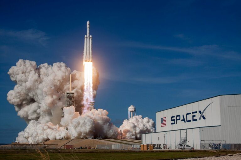 SpaceX rocket ship launching during daytime