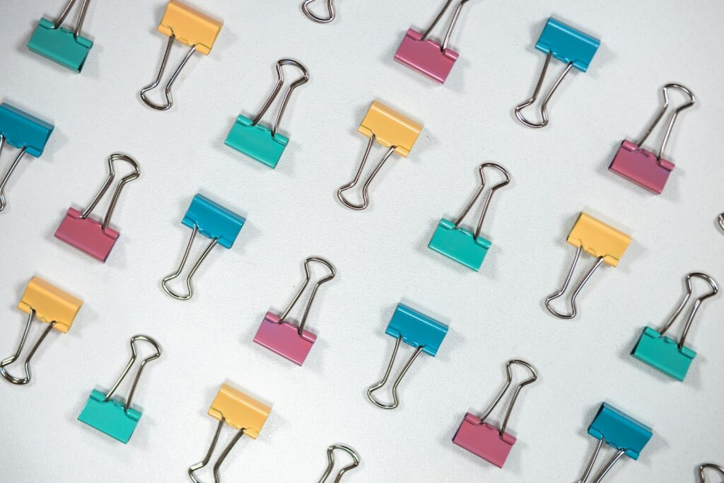 a group of clips with a paper clip attached to them