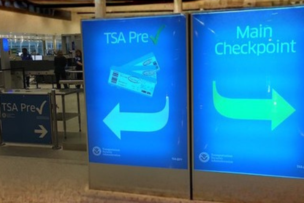 TSA PreCheck sign at airport checkpoint