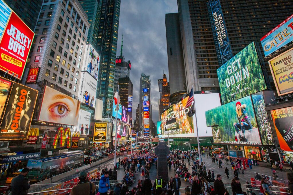 people walking on NY Time Square during daytime