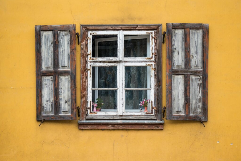 brown wooden framed glass window