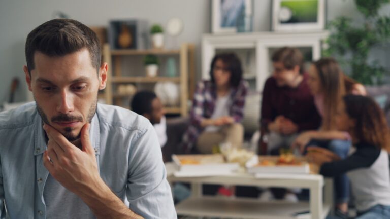 person feeling watched group meeting