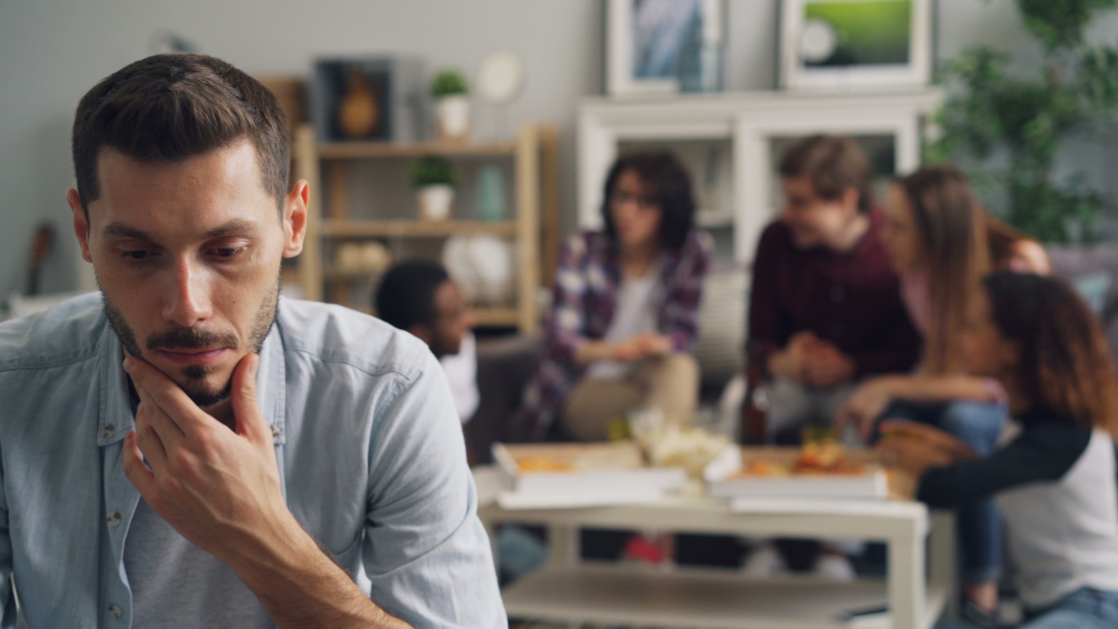 person feeling watched group meeting