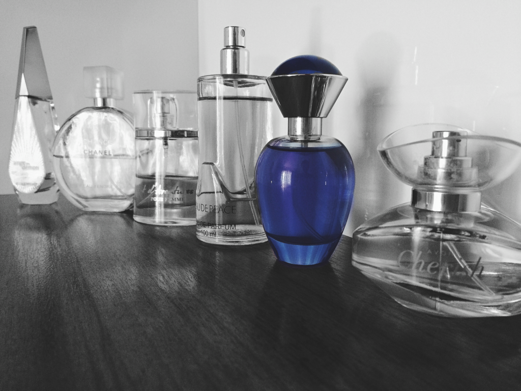 A captivating display of assorted perfume bottles showcasing luxury and elegance.