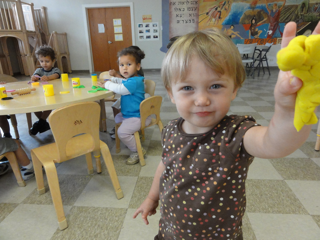 Children playing with play doh