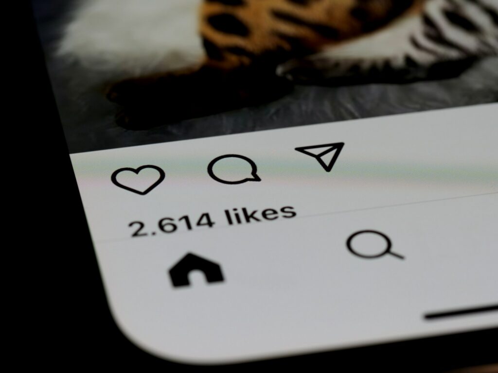 Close-up likes on social media app to illlustrate algorithm bias