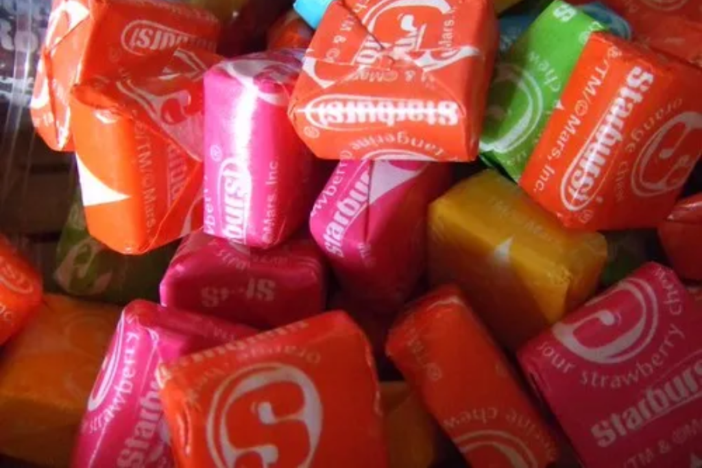 Assorted starburst candy in colorful wrapping paper