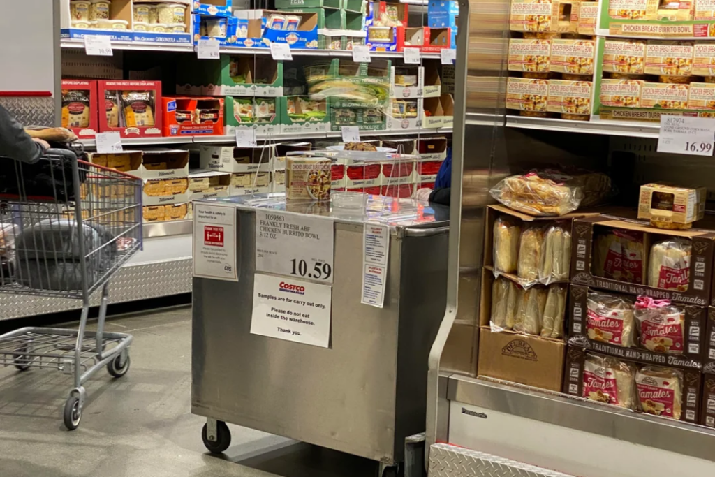 Costco sample station near product display