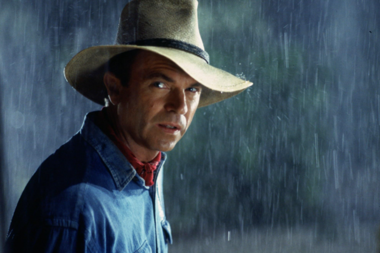 Dr. Alan Grant remains alert during a dangerous night in Jurassic Park.