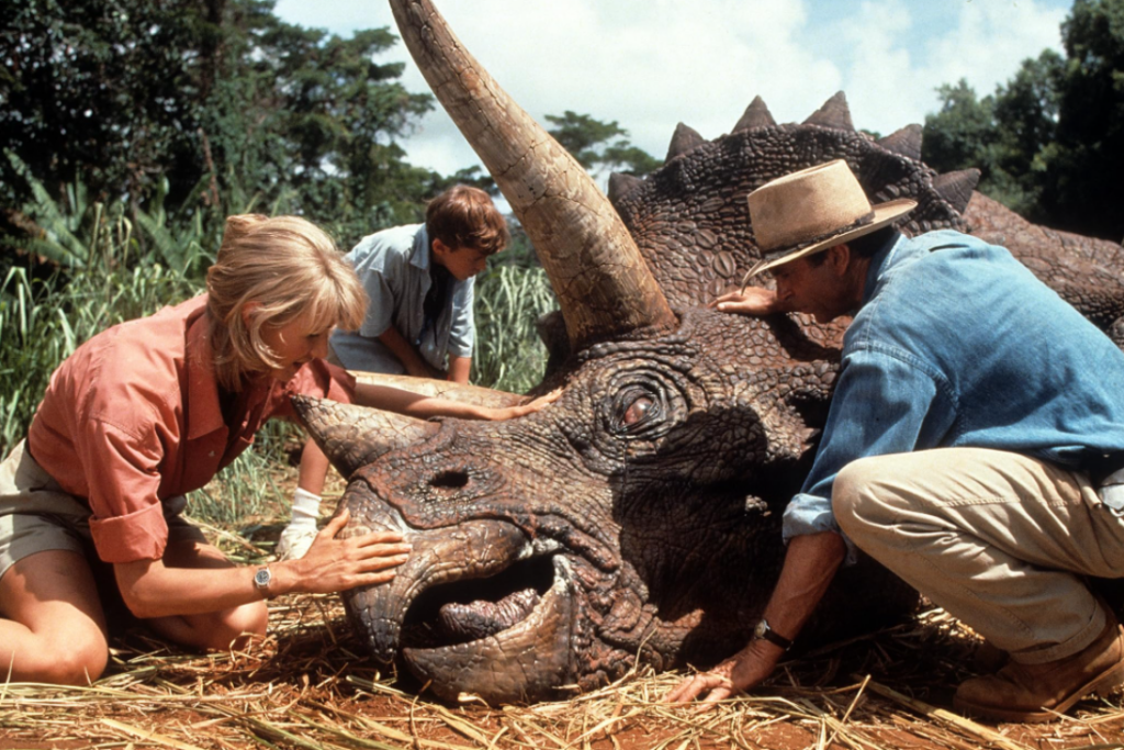 Dr. Alan Grant and Ellie Sattler examine a sick Triceratops in Jurassic Park.