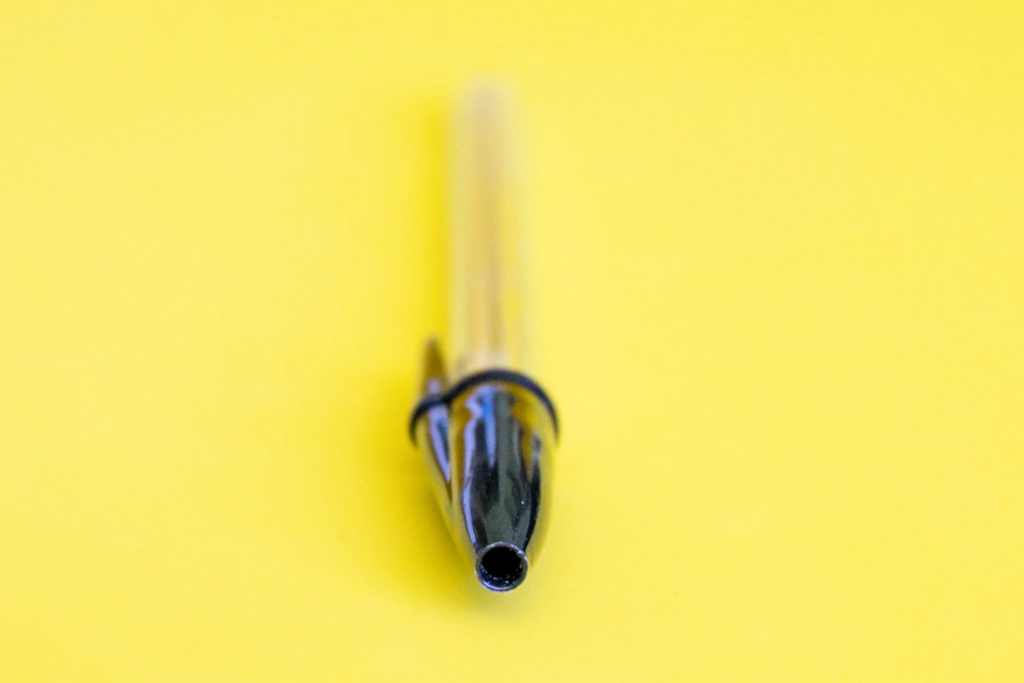 The purpose of the small hole in a pen cap