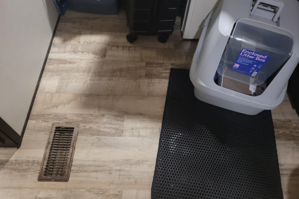 Cat litter box near vent