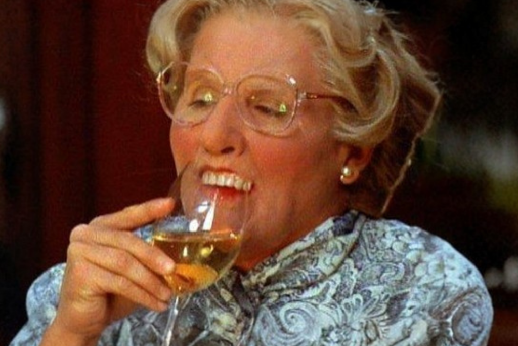 Mrs. Doubtfire retrieving her teeth from a glass