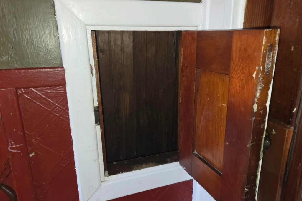 Old laundry chute in a 1920s vintage house