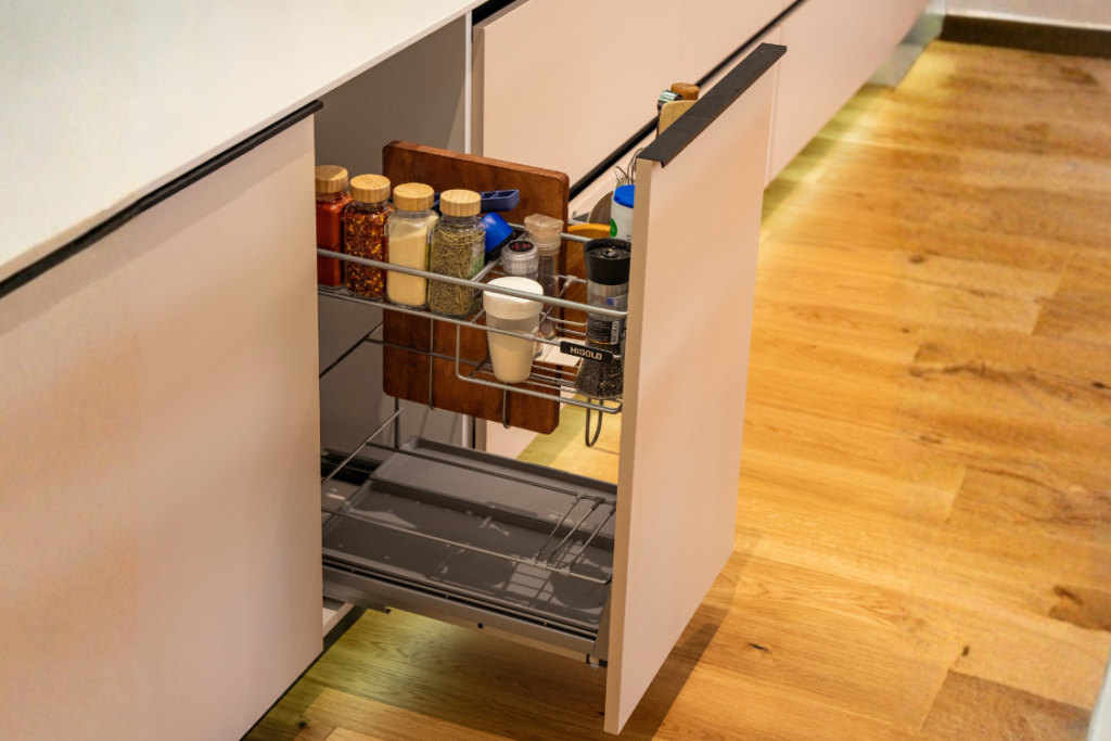 Contemporary kitchen featuring a pull-out spice rack