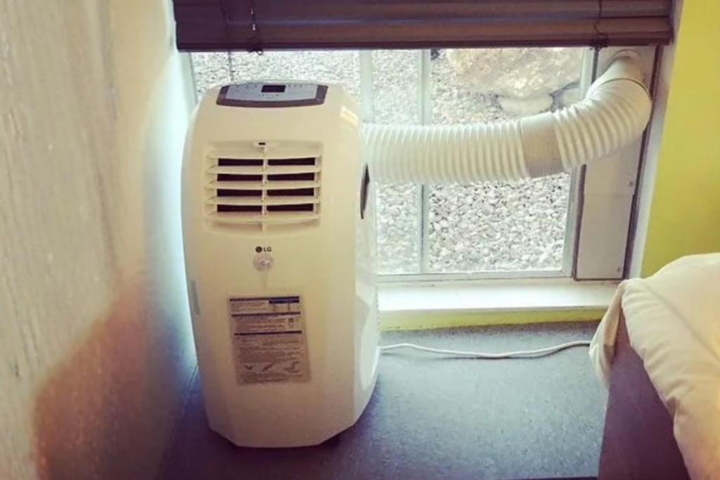 Single hose portable air conditioner