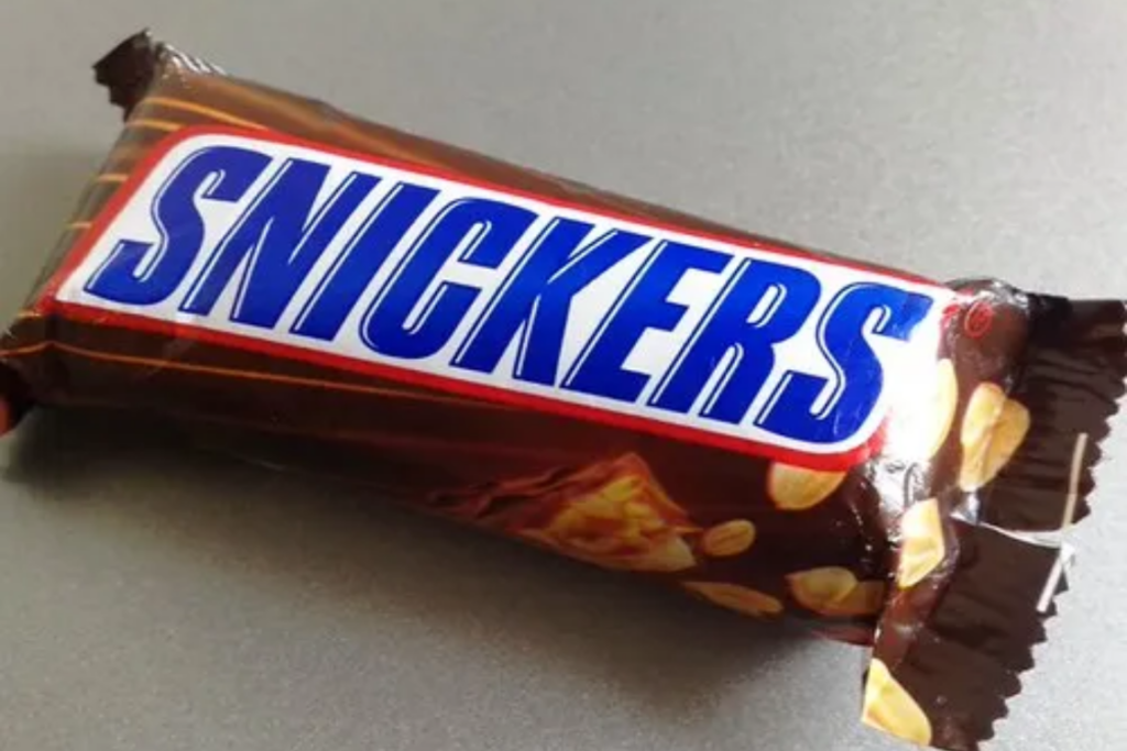 Snickers nougat chocolate bar with caramel and peanuts