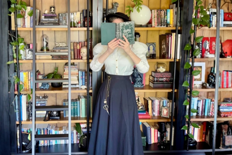 Woman reading book on Victorian etiquette
