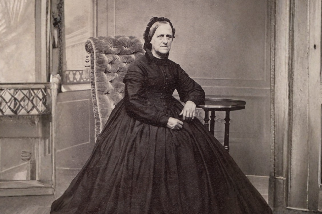 Victorian woman in mourning black dress