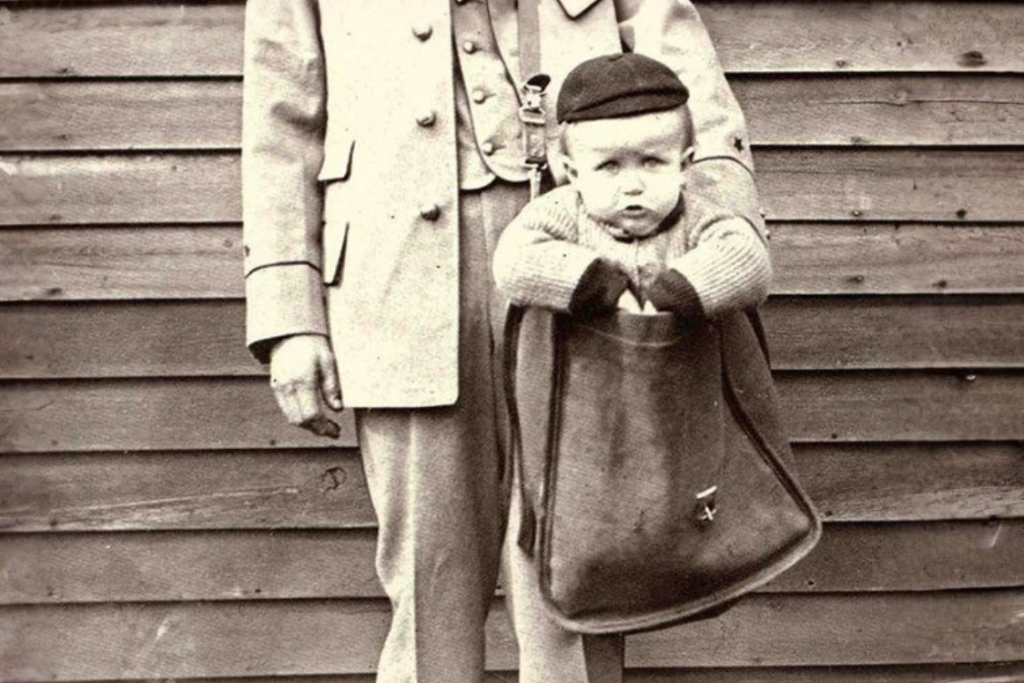 Vintage mail carrier with child