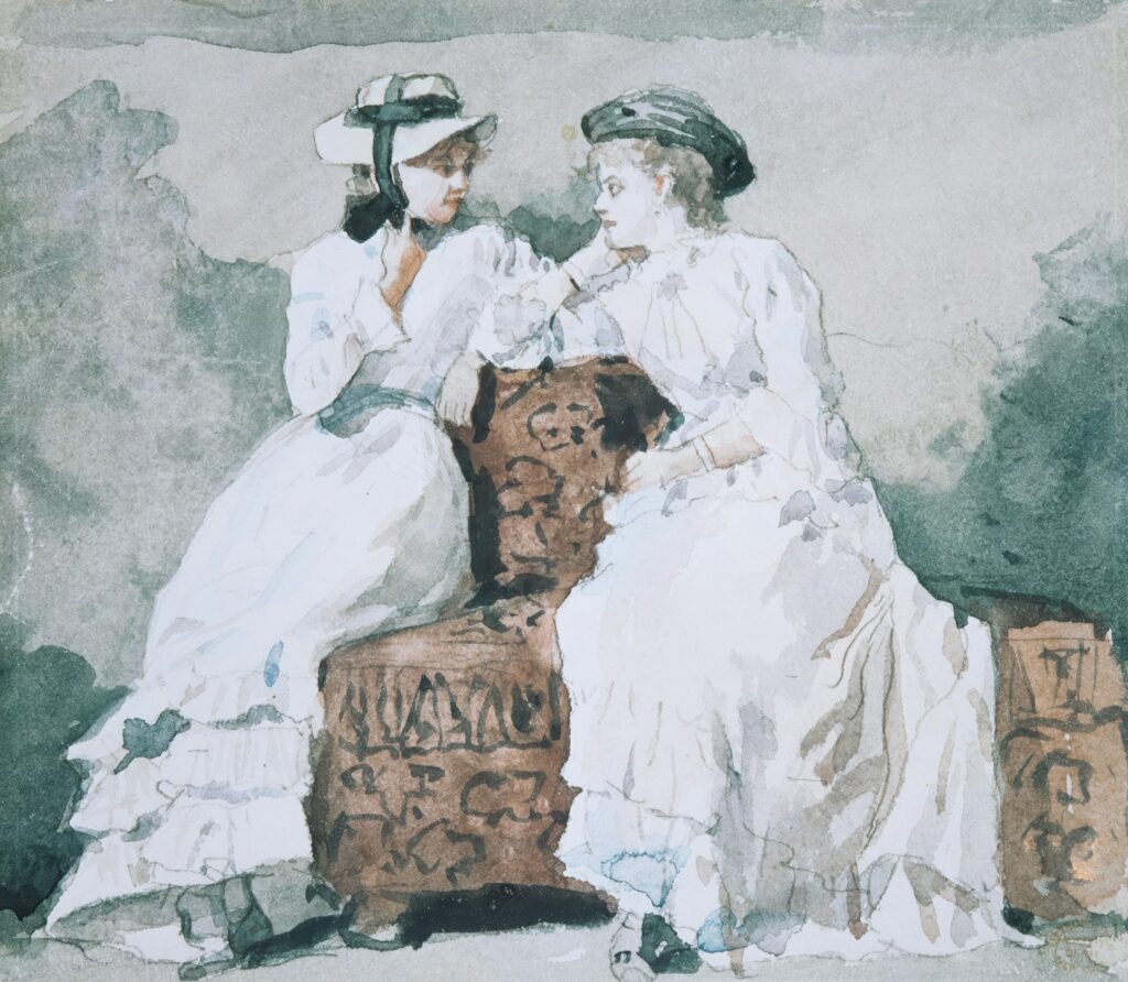 Two women in white dresses and hats conversing.